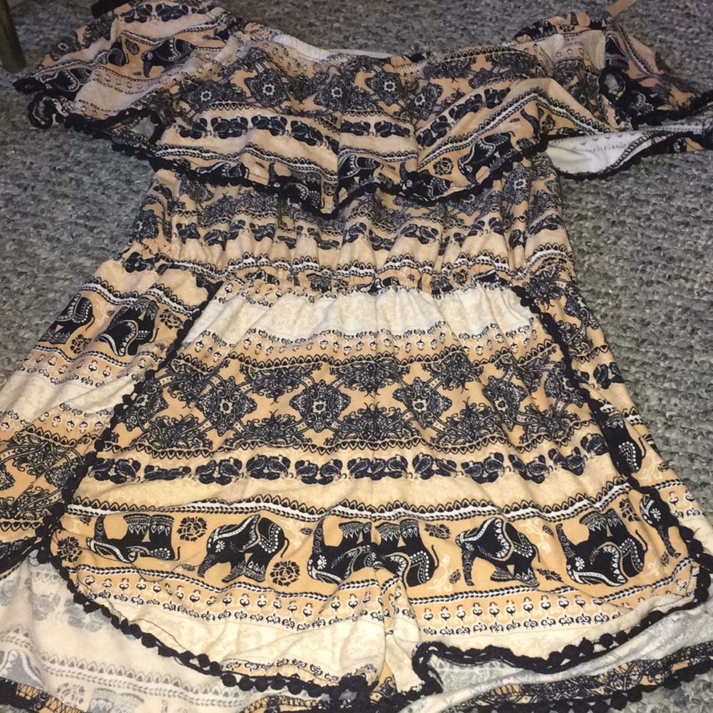 Cute over the shoulders romper.